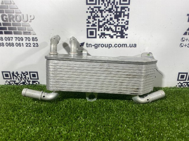 JX6Z7869C Радиатор охлаждения АКПП купить Ирпень