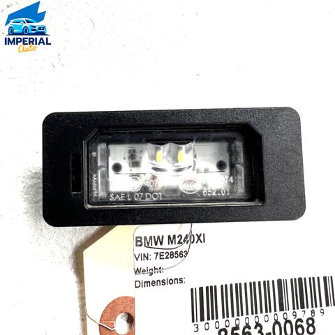 Фонарь освещения номерного знака 7193293 BMW