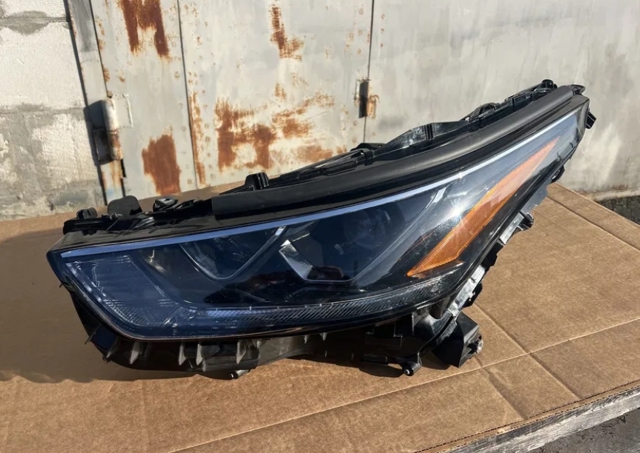 Фара левая 811500E521 TOYOTA