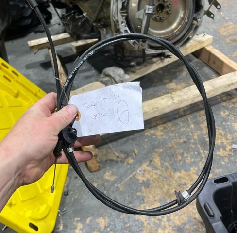 CV6Z16916A Трос открывания капота купить Киев