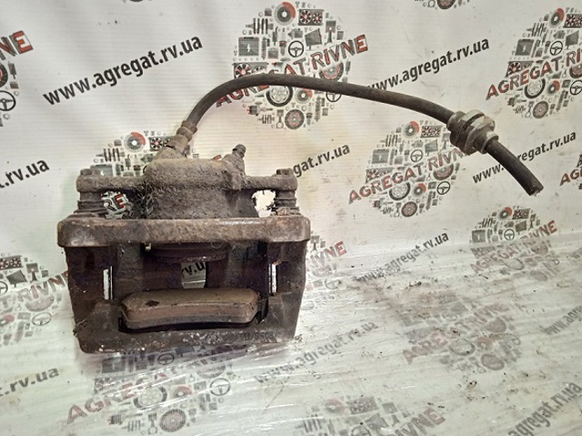 Суппорт тормозной, передний, левый 7701209862 RENAULT