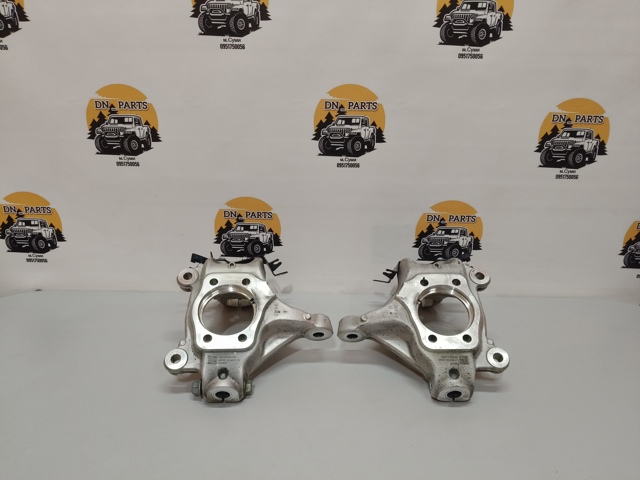 Цапфа поворотная левая 400156RA0A NISSAN