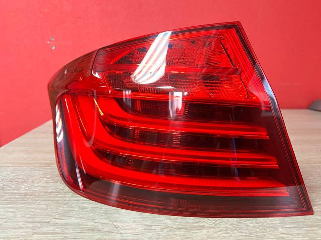 Фонарь задний левый, внешний 63217312707 BMW
