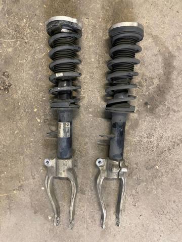 Амортизатор передней подвески левой 31316866613 BMW