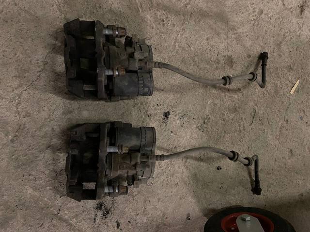 Суппорт тормозной, передний, правый 34116860268 BMW