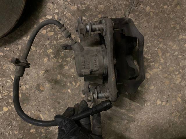Суппорт тормозной задний правый 34206883034 BMW