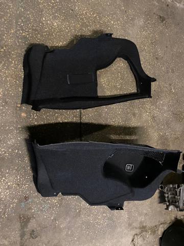Облицовка багажного отсека, левая 51477289011 BMW