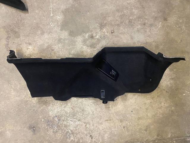 Облицовка багажного отсека, левая 51477373581 BMW