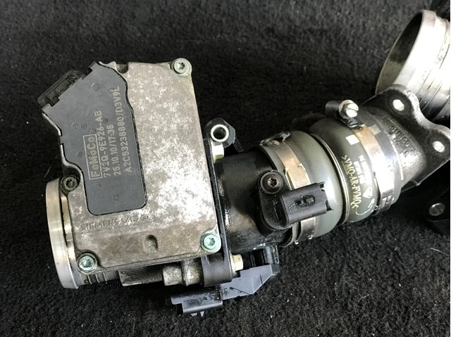 Блок дроссельной заслонки 7V2Q9E926AB FORD