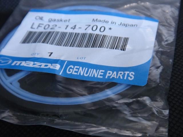 LF0214700 MAZDA Радиатор масляный (холодильник), под фильтром купить в Тернополь