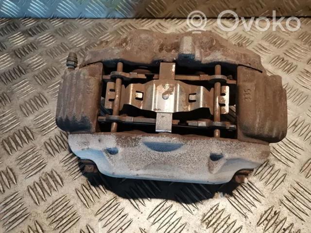 Suporte do freio dianteiro esquerdo 0034205183 Mercedes