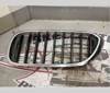 Grelha do radiador esquerda 51137390863 BMW