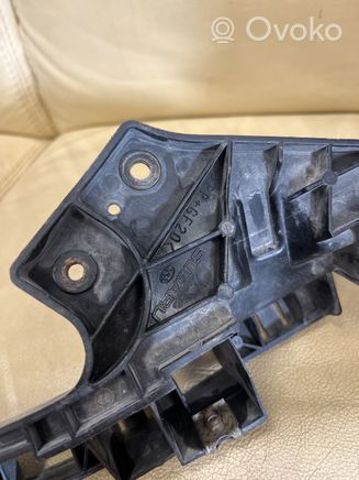 Consola (adaptador) de fixação da luz dianteira esquerda 57707SC010 Subaru
