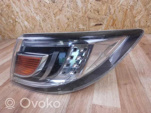Lanterna traseira esquerda externa GS1F51160G Mazda