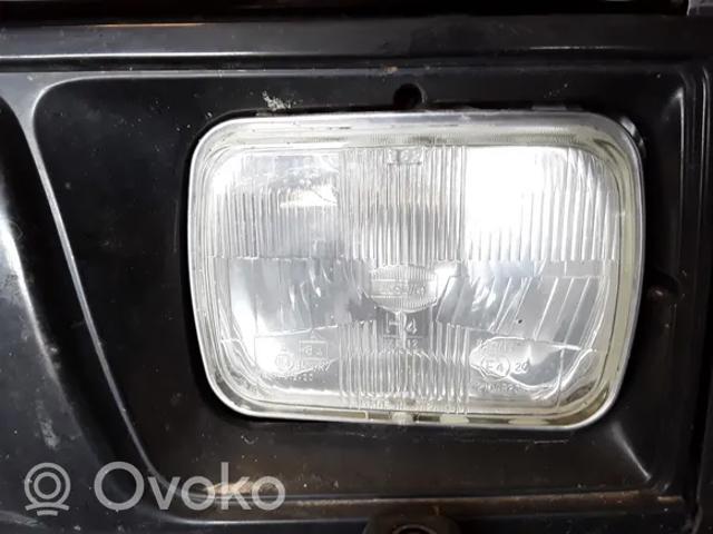 Luz esquerda MR392411 Mitsubishi