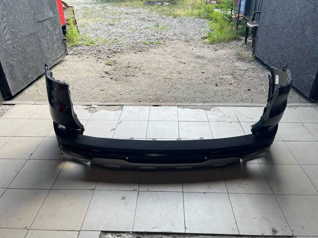 Клык заднего бампера левый 51125A0BD55 BMW