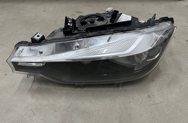 Основная фара в сборе левая 63117338709 BMW