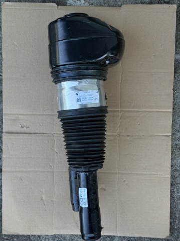 Амортизатор передний левый 37107915945 BMW