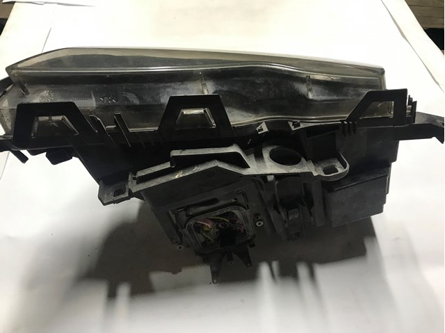 6910967 BMW Фара левая купить в Павлоград