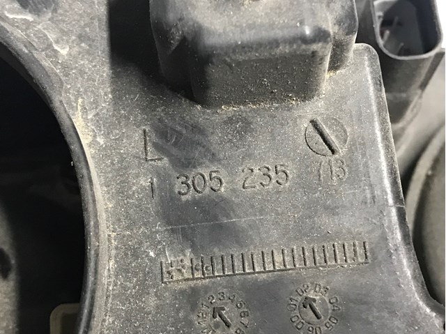 6910967 BMW Левая фара купить в Винница