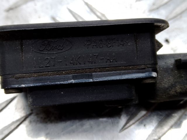 Кнопка привода замка крышки багажника (двери 3/5-й (ляды) 1L2Z14018AC FORD