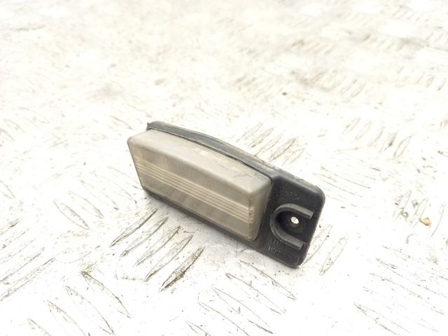 Фонарь освещения номера 265108990B NISSAN