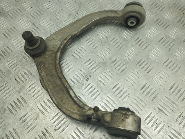 Рычаг передней подвески верхний левый 31126863333 BMW