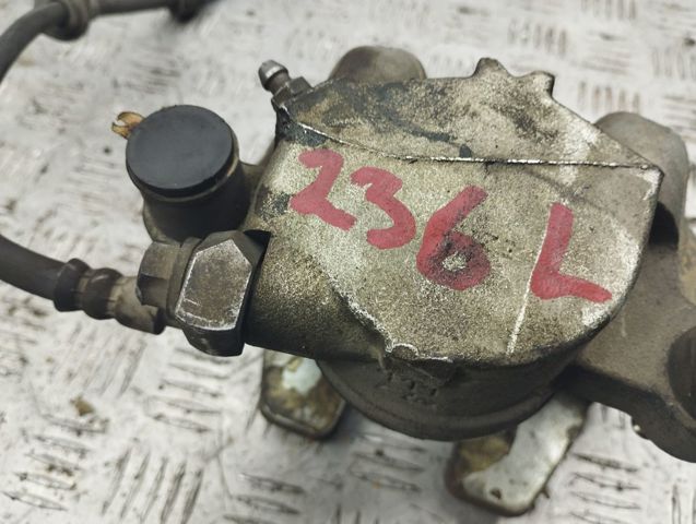 Суппорт тормозной, передний, левый 36010012 VOLVO