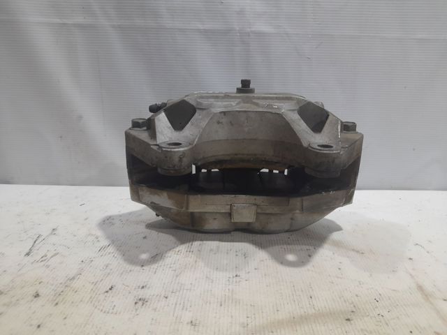 Суппорт тормозной передний левый 41011JL02A NISSAN