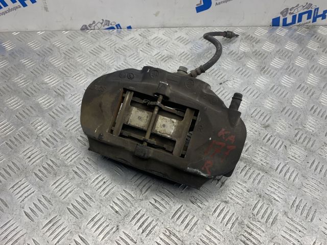 Суппорт тормозной, передний, правый 4773030560 TOYOTA