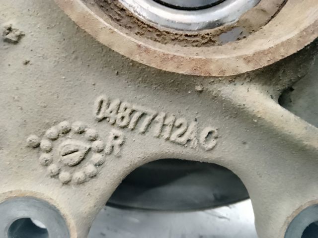Цапфа - поворотный кулак задний, правый 4877112AC CHRYSLER
