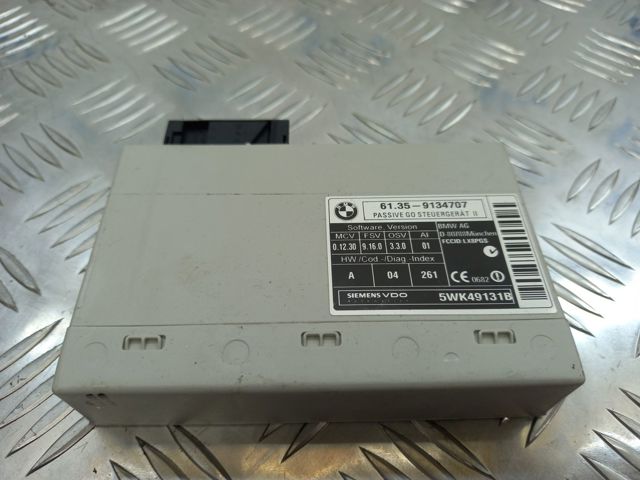 Блок управления центральным замком 61359134707 BMW