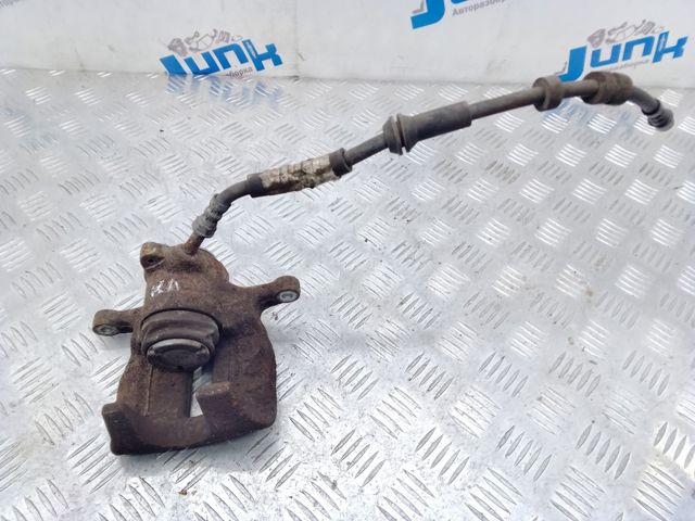 Задний правый суппорт 8K0615404E VAG
