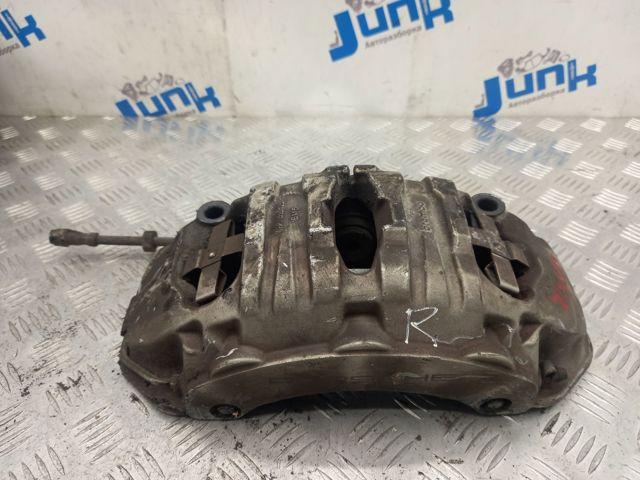 Суппорт тормозной передний правый 95B615124A PORSCHE