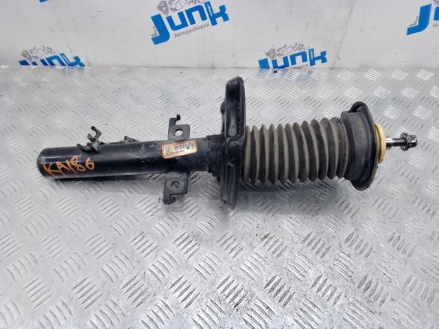 Амортизатор подвески передний левый E43034BA1C NISSAN
