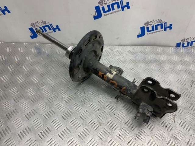 Амортизатор передней подвески левой E43035AA0C NISSAN