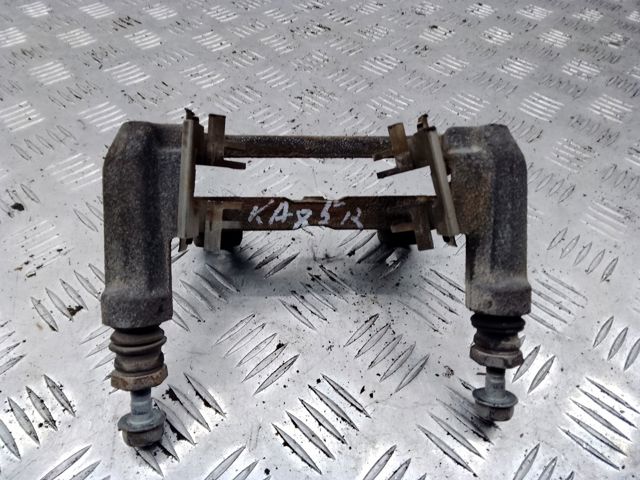 Скоба тормозного суппорта заднего KAY02628X MAZDA