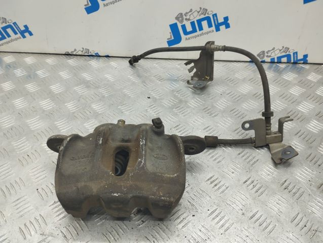 Суппорт тормозной, передний, левый LR047905 LAND ROVER