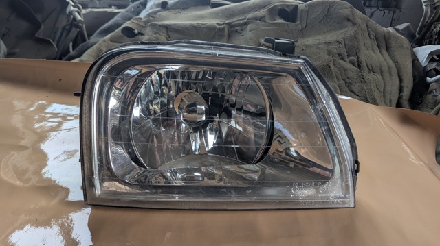 Фара комбинированная, передняя MR439534 MITSUBISHI