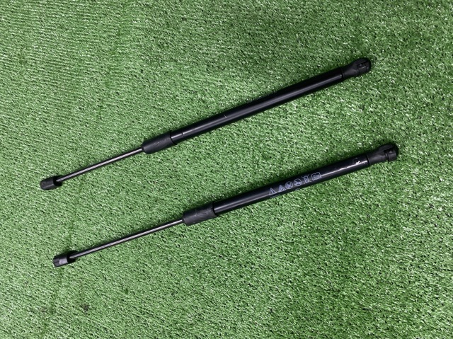 Стойка капота 80A823359C VAG