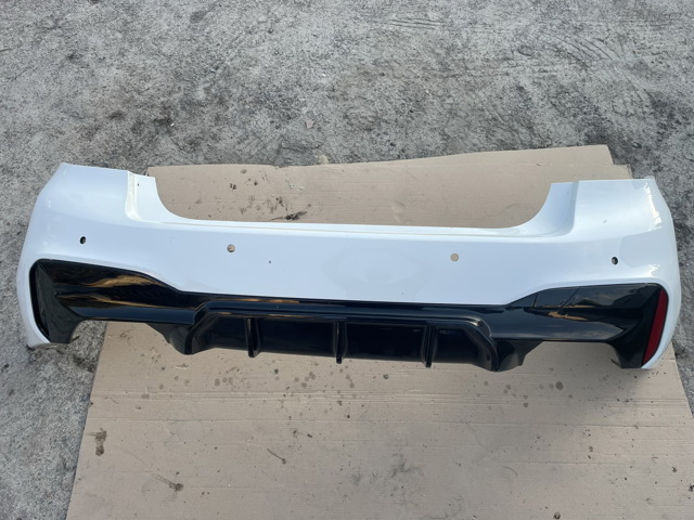 Бампер задний 51128073725 BMW