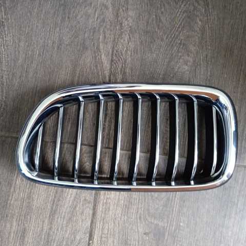 Решетка радиатора левая 7336477 BMW