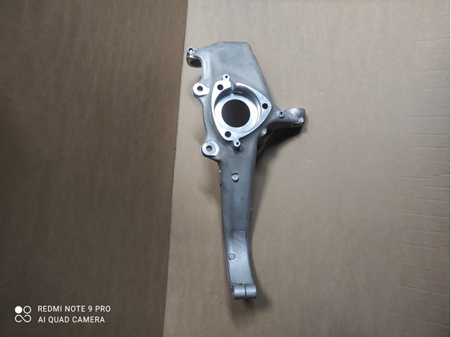 104431100E Tesla Model Цапфа передняя левая купить в Житомир