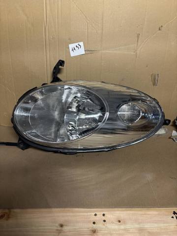 Основная фара - вставка 26010AX700 NISSAN