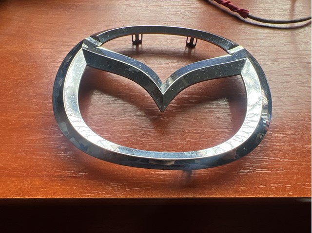 GHP951731 MAZDA Эмблема решетки радиатора купить в Сумы