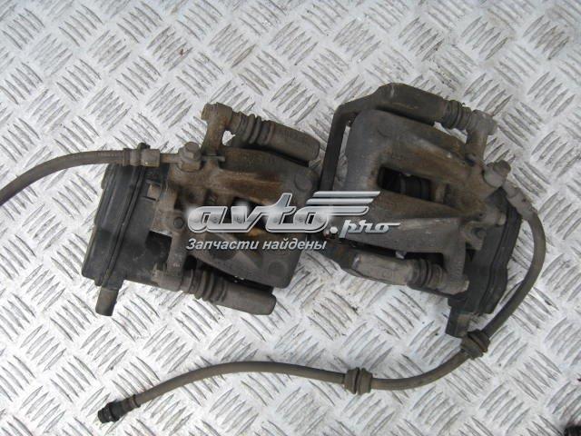 Тормозной суппорт задний левый LR027128 LAND ROVER