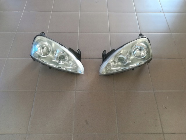 Блок фара левая 13100535 OPEL