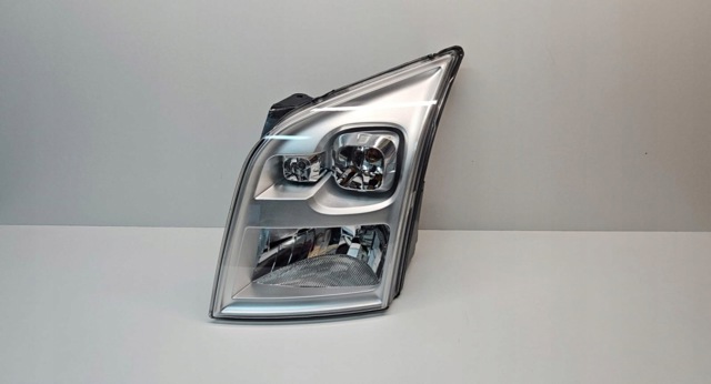Вставка фары левой 6C1113W030CD FORD