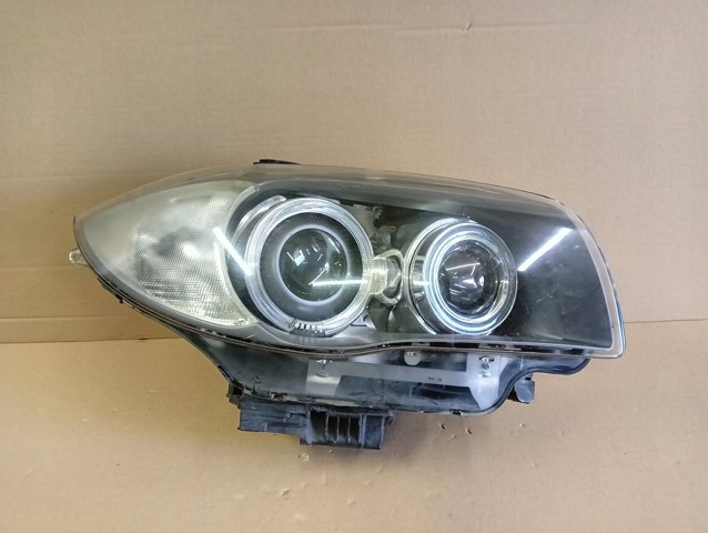7170292 BMW Правая фара купить в Павлоград