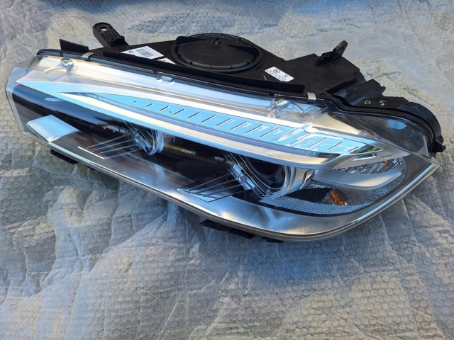 7317109 BMW Левая фара купить в Тернополь